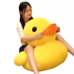 Grand canard jaune en peluche de dessin animé
