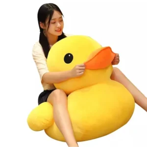 Grand canard jaune en peluche de dessin animé