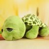 Peluche bébé tortue super verte aux grands yeux