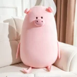 Coussin-câlin ovale en forme de cochon, rose uni et ultra-doux (70 cm).