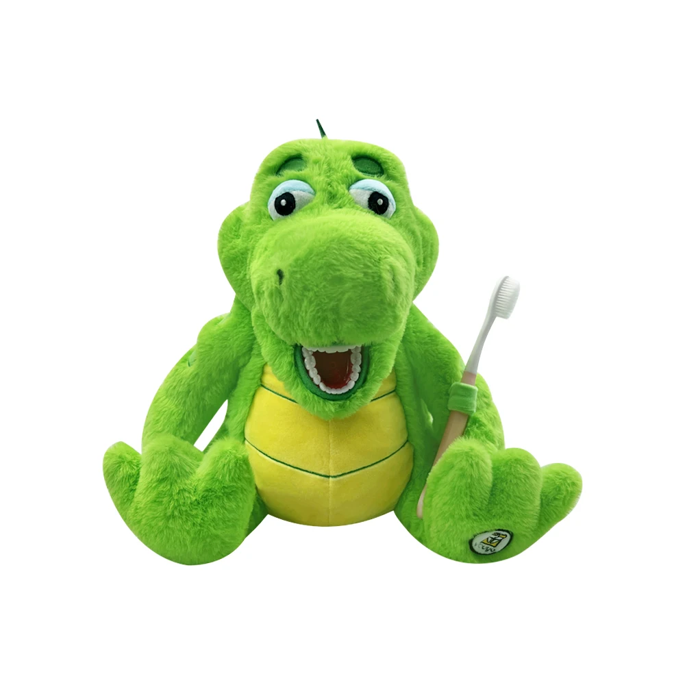 Un peluche dentaire en forme de crocodile avec modèle de dents