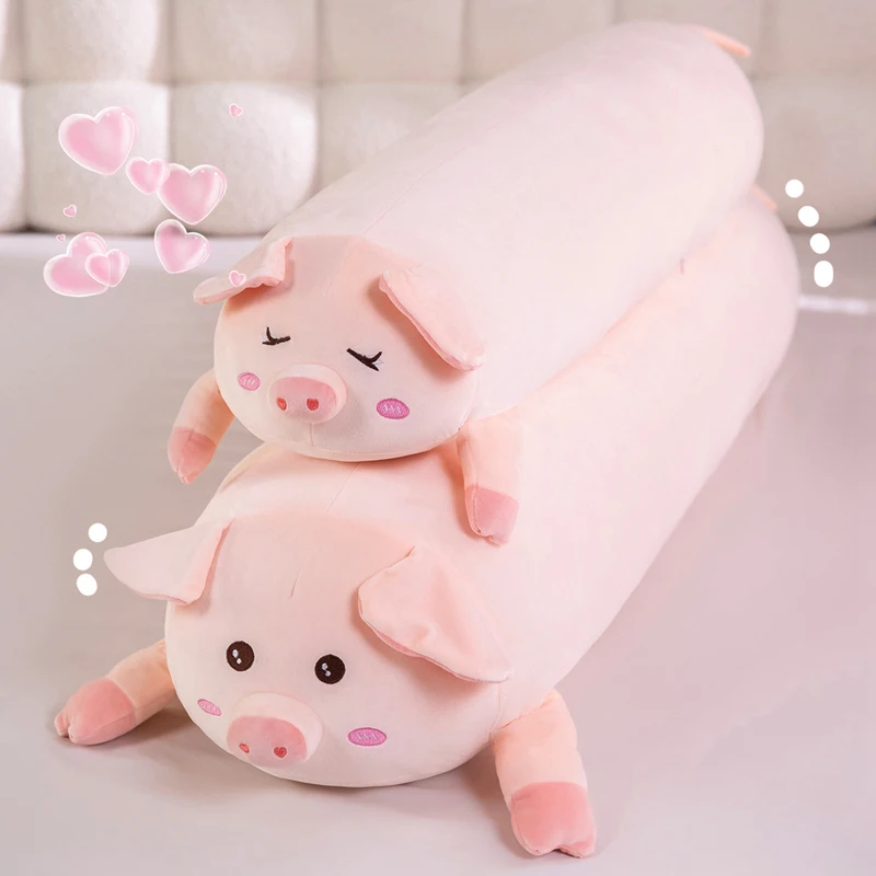 Coussin long en peluche rose en forme de cochon